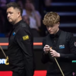 sheffield-england-kyren-wilson-of-england-and-stan-moody-of-england-at-the-table-during-day-6873995